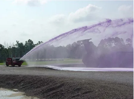 Figure 4.5.4: 300 gpm combined agent Williams Hydro-ChemTM bumper turret nozzle being used to conduct a combined agent throw test. figure 4.5.4